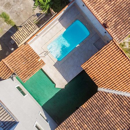 Refugio Tropical Casa De Praia Com Piscina Aquecida E 4 Suites E Garagem 3 Carros, 800 Mtrs Da Praia Internet 700 Mbps, Condominio Privado Com Pista De Skate , Quadra De Futevolei , Campos E Quadras De Futebol! كابو فريو المظهر الخارجي الصورة